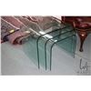Image 1 : Set of three curved glass nesting tables, the largest being 20" H X 23" W X 20" D, note: two chips s