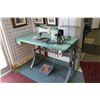 Image 1 : Consew Model 105 commercial sewing machine on industrial stand with foot pedals, working at time of 
