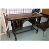 Image 1 : Small antique writing desk with book storage on either side and barley twist supports, 30" H X 48" X