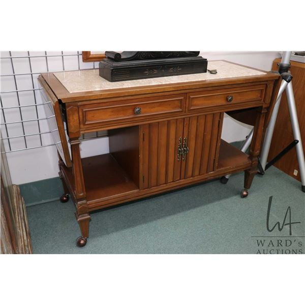 Vintage drop side server with two drawers, one fitted for flatware, heat protective insert top on ca