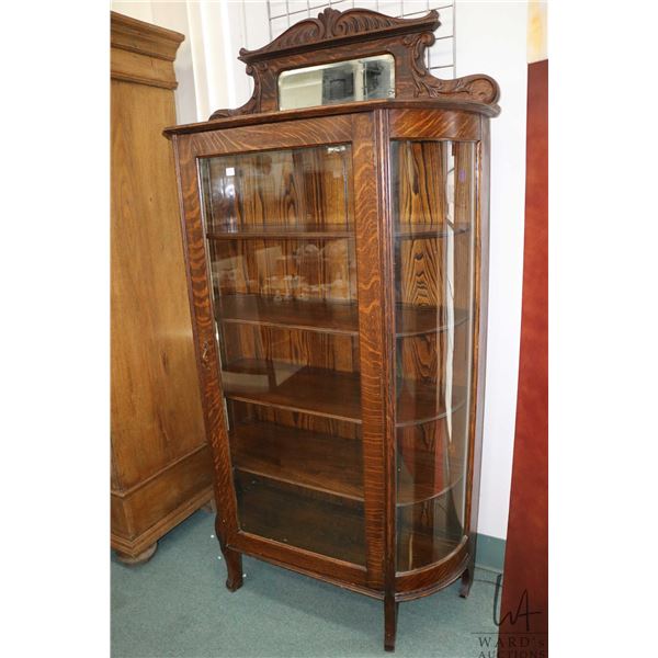Antique quarter cut oak, single door, curved glass display/ china cabinet, 60" H X 38" W X 15" D not