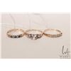 Image 1 : Three gold rings including 14kt-18kt size 7.5 gold band, 10kt ring set with three colourless gemston