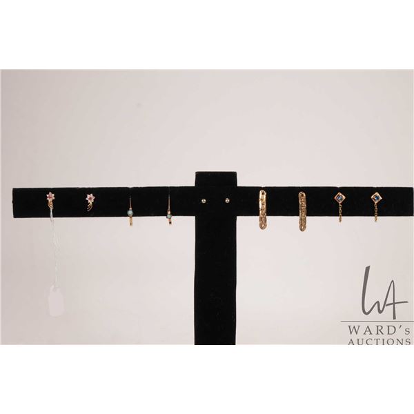 Two pairs of gold earrings including 18kt flattened curb chain marked 750 and tested 14kt hoops with