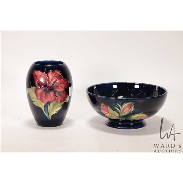 Two pieces of Moorcroft pottery including 5" Hibiscus vase and a 6 1/2" Columbine dish