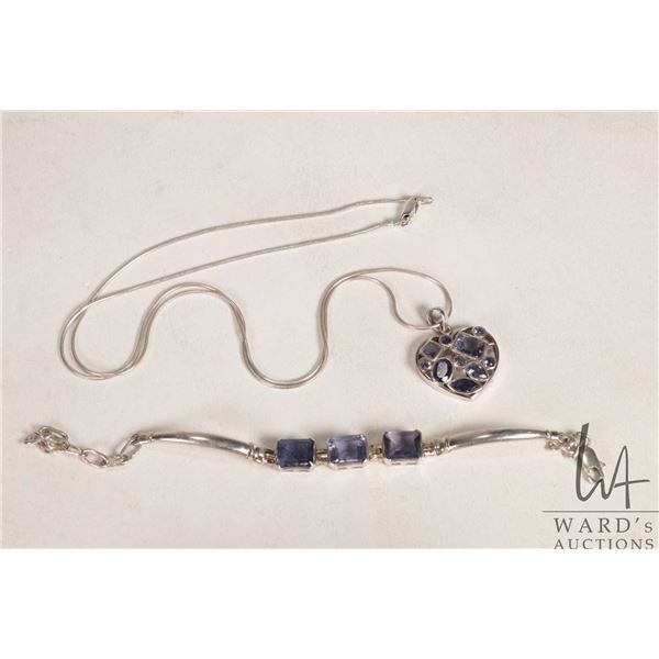 25" sterling silver neck chain marked Italy 925 with faceted amethyst gemstone heart pendant and an 