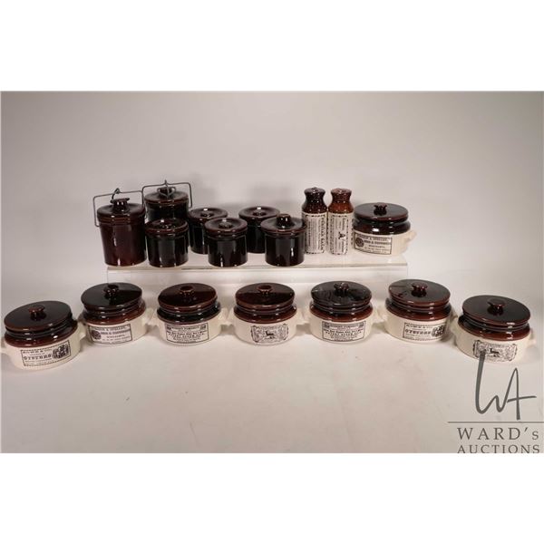 Selection of vintage Abenakis pottery lidded jars from the "Ye Olde Canadian Crock Prints" series in