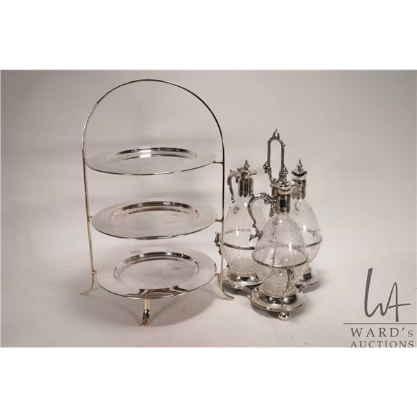 Antique Victorian silverplate cruet set with three cut crystal ewers, two with original stoppers, 14