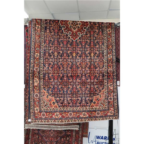 100% hand made Iranian wool carpet, Hamdan with center medallion, blue background and highlights of 
