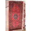 Image 1 : 100% hand made Iranian wool carpet, Baluchi, with center medallion, red background and highlights of