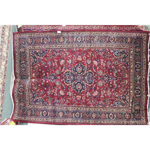 100% hand made Iranian wool carpet, Mashad, center medallion and red background with highlights of c