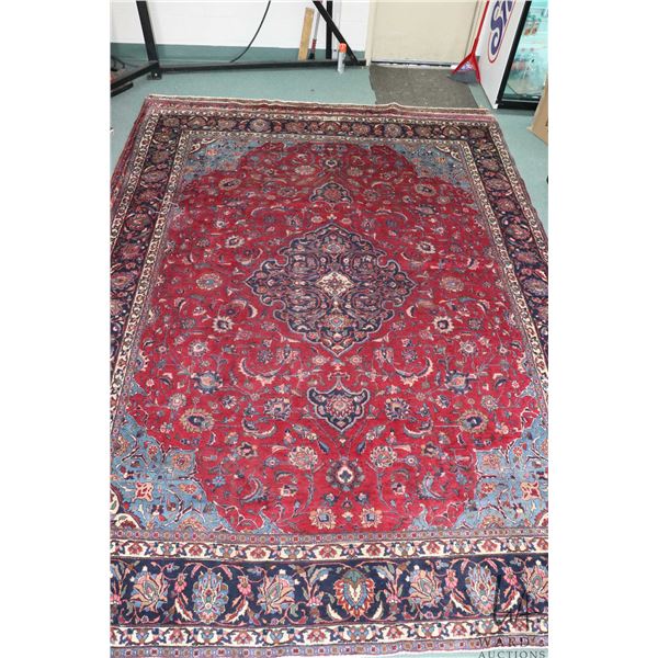 100% hand made Iranian wool carpet, Mashad with center medallion and signed, red background and high