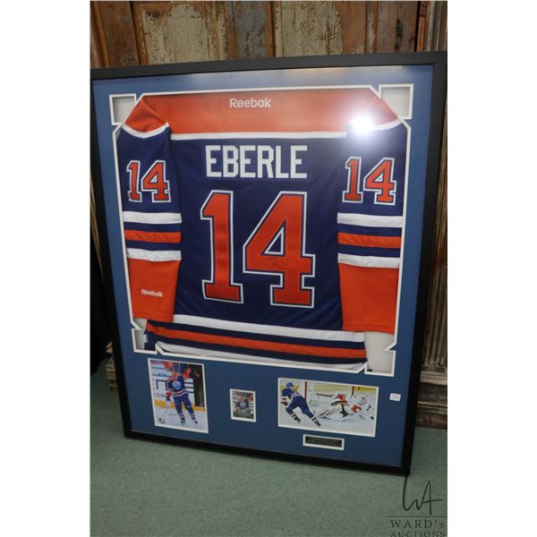 Shadow box framed, hand signed No.14 Eberle jersey with promo photos, outside dimension including fr