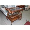 Image 1 : Semi contemporary tea trolley with glass shelves and fold down handle, 28" X 19" X 31"