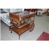 Image 2 : Semi contemporary tea trolley with glass shelves and fold down handle, 28" X 19" X 31"