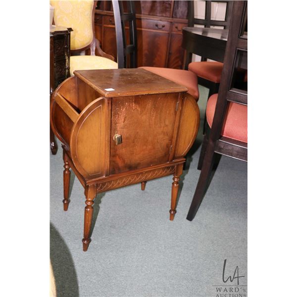 Antique walnut single door smoker's cabinet with magazine storage, 25" X 20" X 12"
