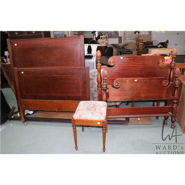 Two non-matching cot sized headboards and footboard and a vanity stool