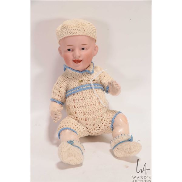 Antique Heubach character doll, mold 7604, with sun marking, bisque head on five piece composition b
