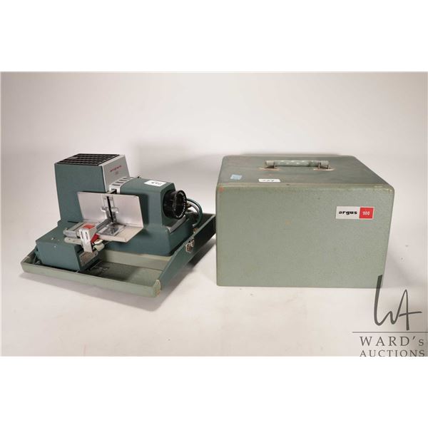 Vintage Argus 300 slide projector with carrying case, not tested at time of cataloguing