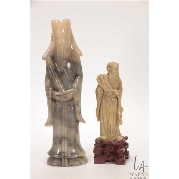 Two Japanese hand carved stone figures including 8 1/4" and 5 3/4"