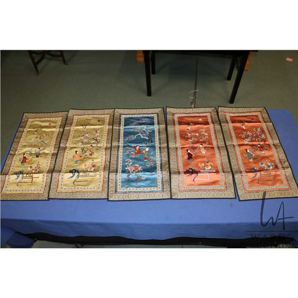 Four Chinese embroidered silk textiles, each 24" X 13"