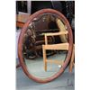 Image 1 : Antique wood framed oval beveled wall mirror Outside dimensions 33"x27"