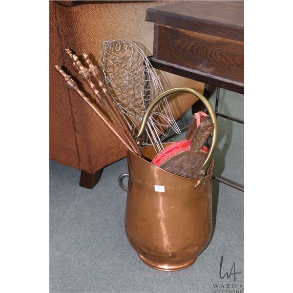 Brass and copper coal hod, set of bellows companion set, and fish motif fire cooker