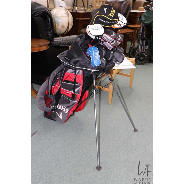 Callaway golfbag with a set of left handed Callaway clubs including five irons, five metal woods, an