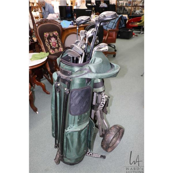 Set of left handed Jazz golf clubs including five irons, five metal woods, a Spalding putter, and a 