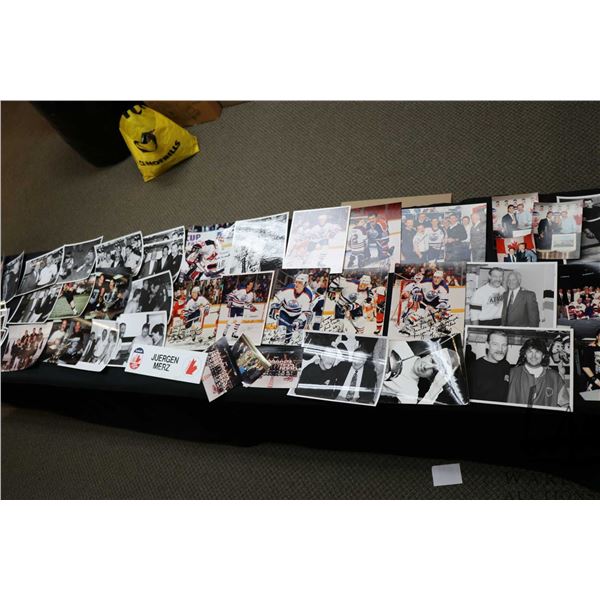 Large selection of colour and black and white promo photos, several hand signed including Kevin Lowe