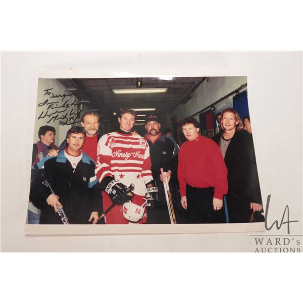 Ninety Nine All Star Tour 9" X 14" hand signed by Gretzky photograph taking during the "Ninety Nine 