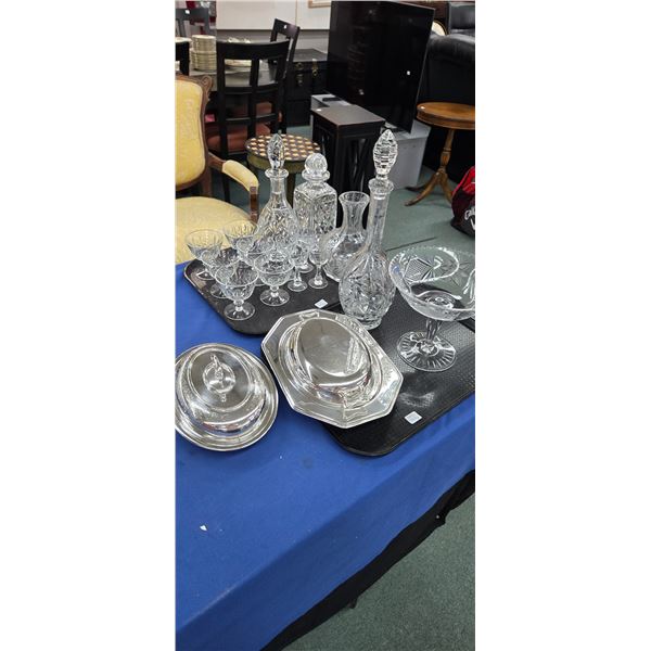Selection of crystal including decanters, stemware, comport and two silverplate lidded serving dishe