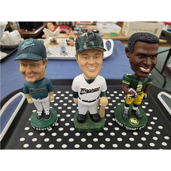 Three Edmonton Sports bobbleheads including Henry "Gizmo" Williams