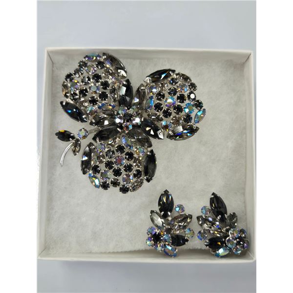 Three pieces of vintage signed Sherman jewellery including iridescent starlight three leaf clover br