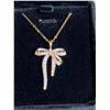 Image 1 : 315 -- 18K GOLD PLATED BOW NECKLACE