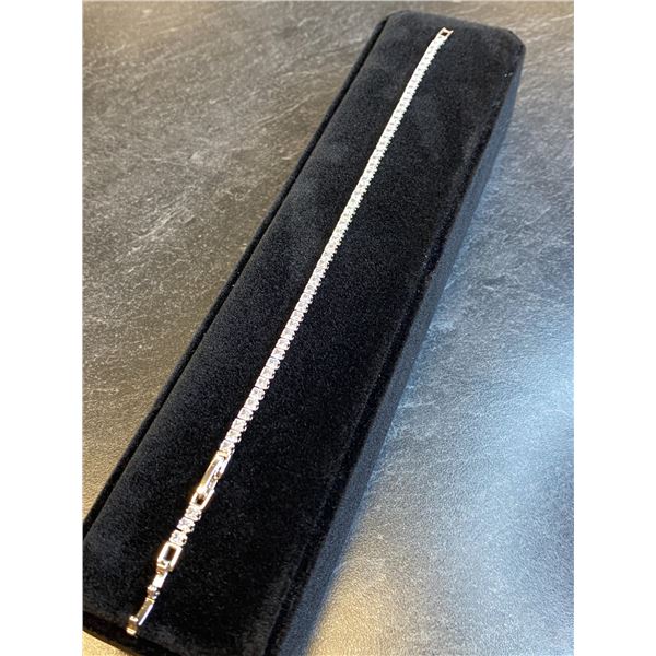 331 -- PLATINUM PLATED TENNIS BRACELET