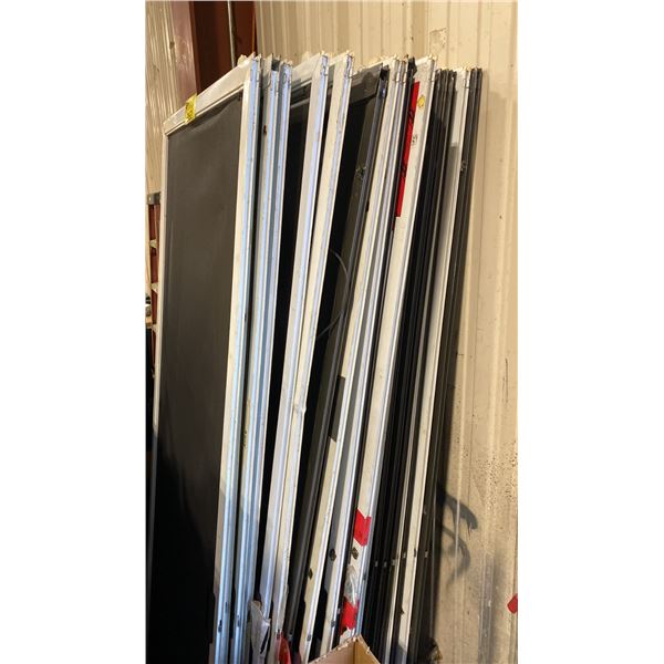 STACK OF ASSORTED 30"W X 79"H MESH SCREEN DOORS *MUST TAKE ALL*