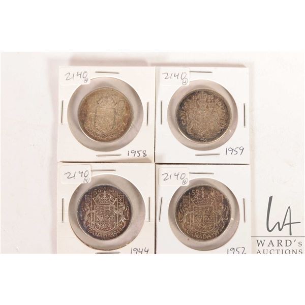 Four Canadian 50 cent coins including 1944, 1952, 1958 and 1959