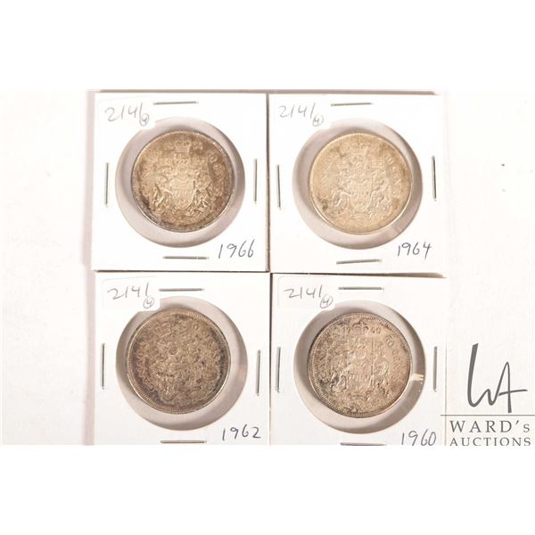 Four Canadian 50 cent coins including 1960, 1962, 1964 and 1966