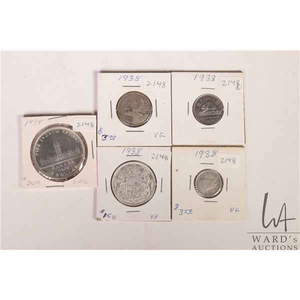Five Canadian 1938 coins including nickel, dime, quarter, fifty cent and silver dollar