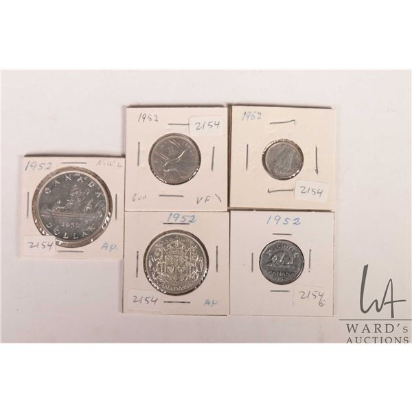 Five Canadian 1952 coins including nickel, dime, quarter, fifty cent and silver dollar