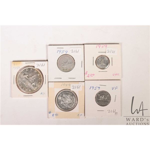 Five Canadian 1959 coins including nickel, dime, quarter, fifty cent and silver dollar