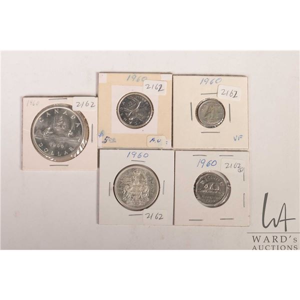 Five Canadian 1960 coins including nickel, dime, quarter, fifty cent and silver dollar