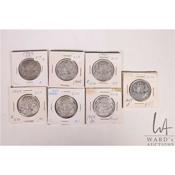 Seven Canadian fifty cent coins including 1939, 1940, 1941, 1942, 1943, 1944 and 1947