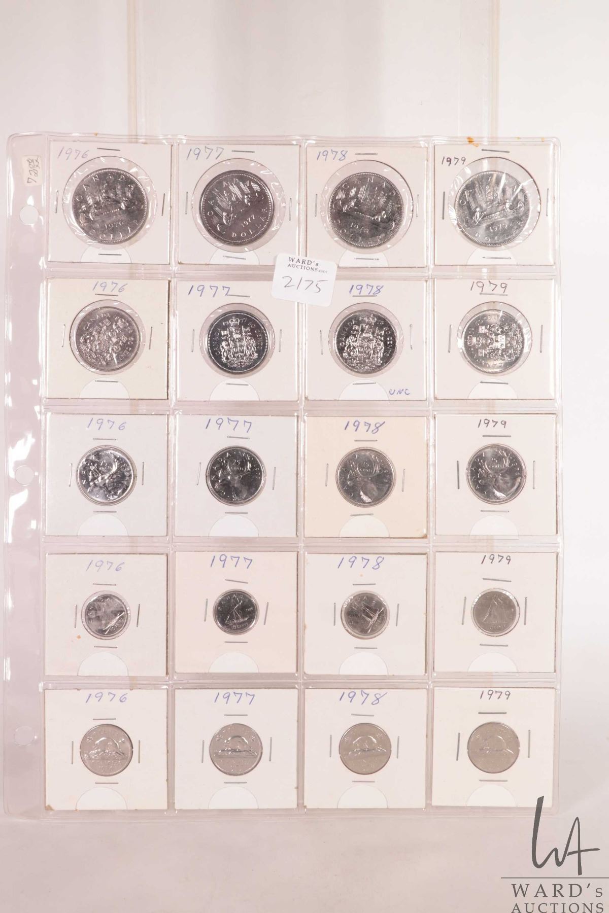 Canadian Coin Collection Sheets Sheet containing Canadian coins including dollar, fifty cent, quarter ...