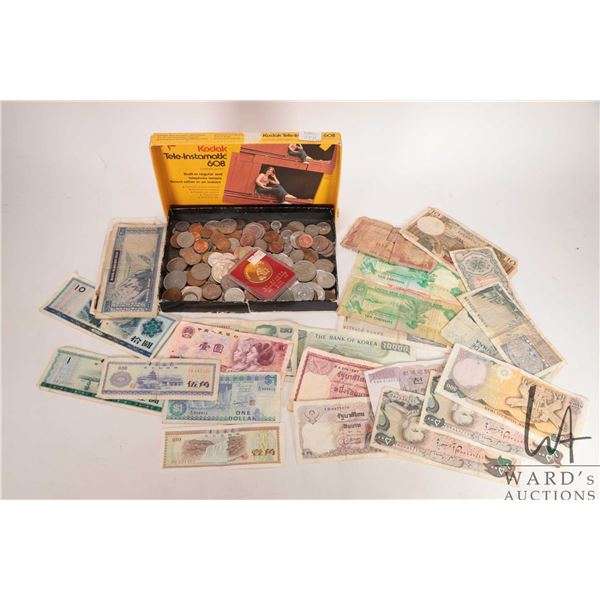 Large selection of foreign coins and bank notes