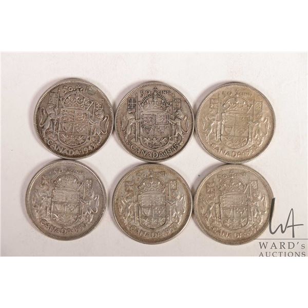 Six Canadian fifty cent coins including 1943, 1945, 1955, 1956, 1957 and 1958