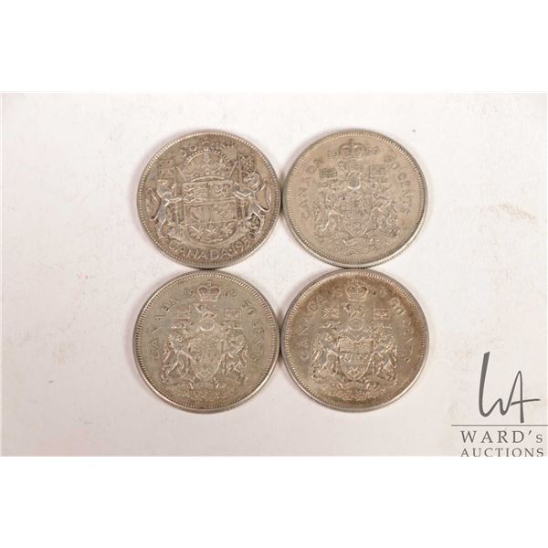 Four Canadian fifty cent coins including 1950, 1959, 1962 and 1964