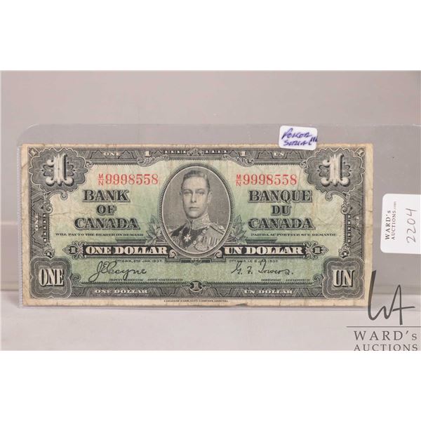 1937 Bank of Canadian one dollar bill with good poker hand serial number