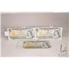 Image 1 : Three Canadian 1973 one dollar bills, all with good poker hands