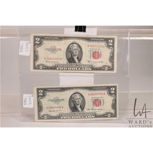 Two 1953 red seal USA $2 bills